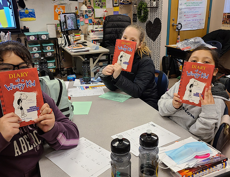 2022 April Winner Kids with their books